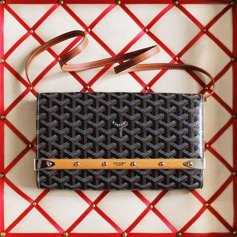 goyard monte carlo clutch with strap